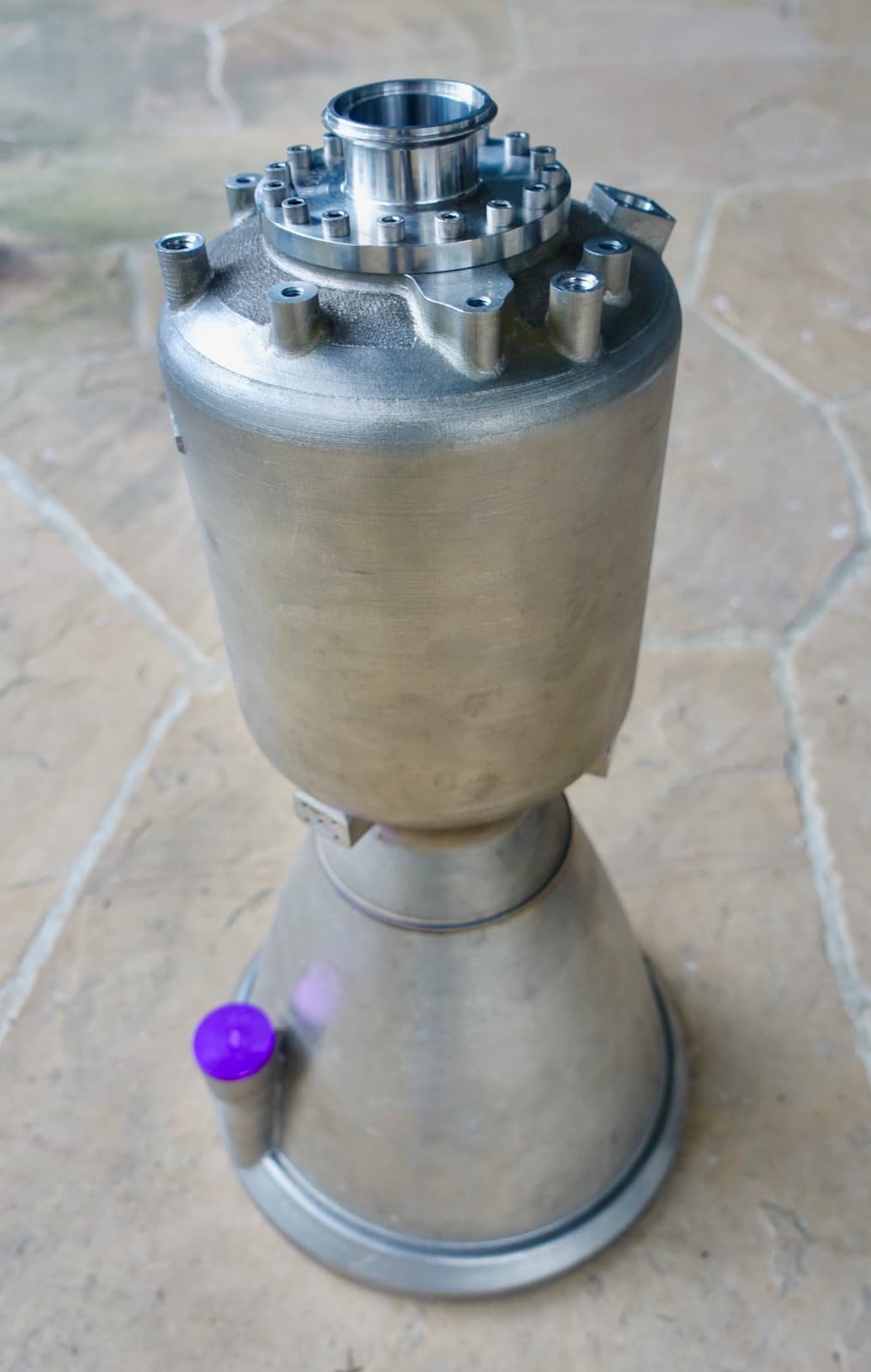 Astra Delphin rocket engine — 3D-printed Inconel with regenerative cooling channels.